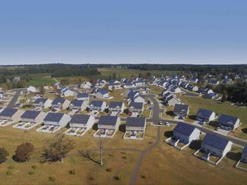 Military installing solar on base housing