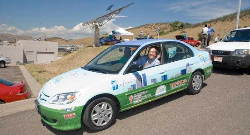 hybrid Honda at NREL in front of a solar array